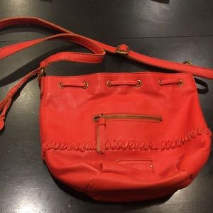 Lucky brand leather purse. Beautiful poppy color, barely used.